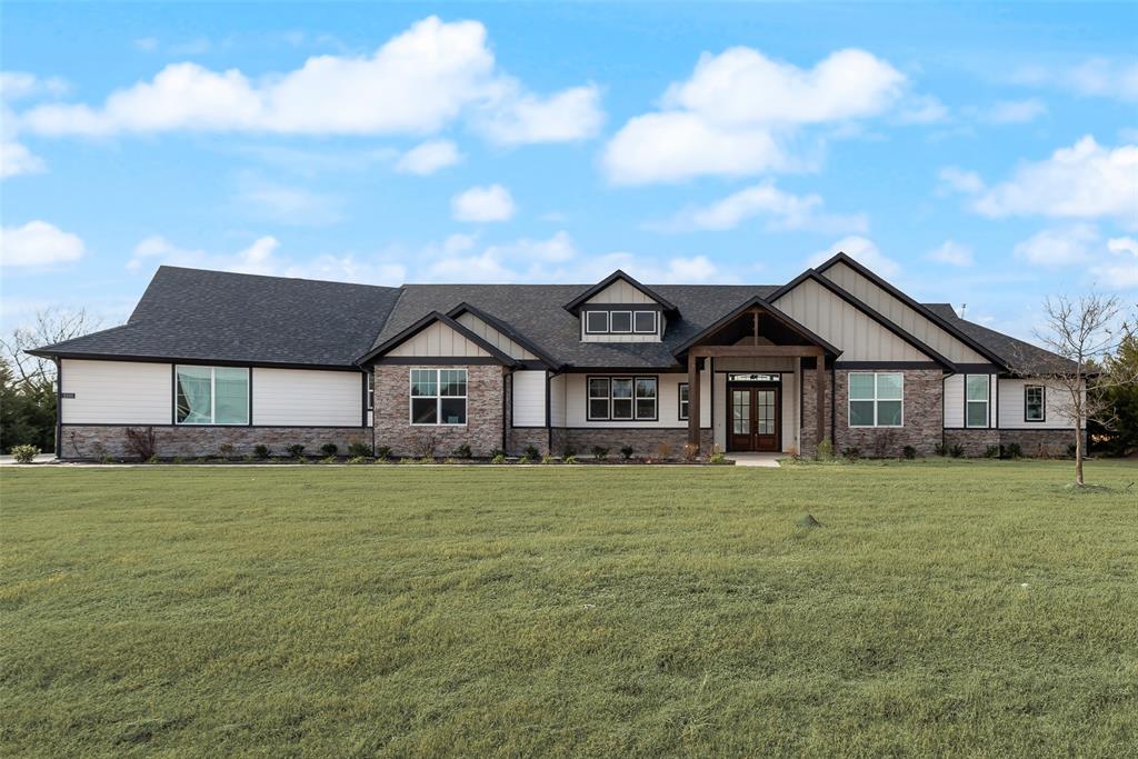 2335 Providence Way Nevada, TX 75173 - Photo 3 of 18 a house that has a big yard with wooden fence