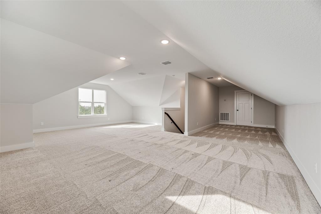 2335 Providence Way Nevada, TX 75173 - Photo 7 of 18 a view of an empty room and window and wooden floor