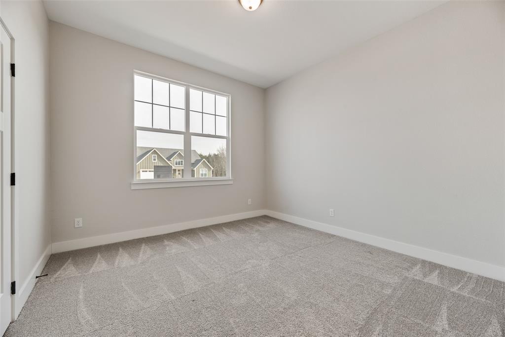 2335 Providence Way Nevada, TX 75173 - Photo 9 of 18 an empty room with windows