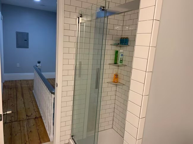 153 Chestnut Street, Unit 1 Waltham, MA 02453 - Photo 7 of 10 a bathroom with a shower
