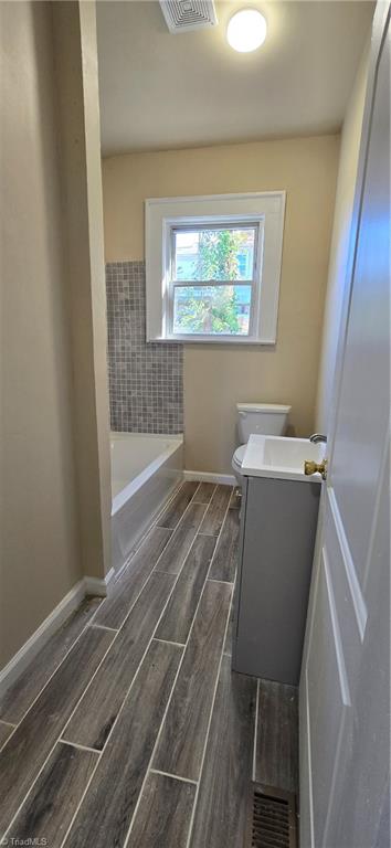 113 Edgeworth Street High Point, NC 27262 - Photo 16 of 24 2nd Full bath with new flooring, tub, cabinet, lighting