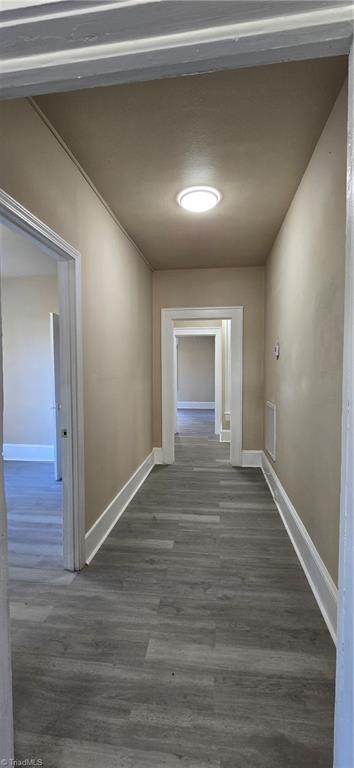 113 Edgeworth Street High Point, NC 27262 - Photo 17 of 24 Hallway leads to many private zones in this updated home