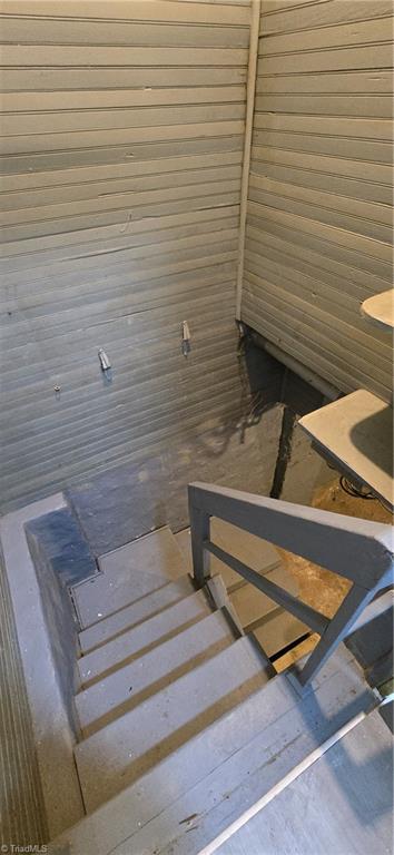 113 Edgeworth Street High Point, NC 27262 - Photo 21 of 24 Stairs lead into utility basement