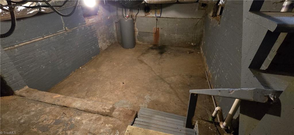 113 Edgeworth Street High Point, NC 27262 - Photo 22 of 24 Utility basement would make a great wine cellar or area to store your canned foods
