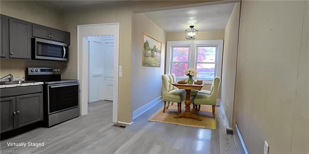 113 Edgeworth Street High Point, NC 27262 - Photo 9 of 24 Dining Room VIRTUALLY STAGED