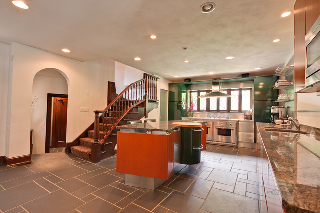 205 Franklin Road Glencoe, IL 60022 - Photo 11 of 25 a view of a kitchen with furniture and a flat screen tv