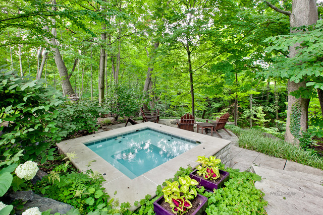 205 Franklin Road Glencoe, IL 60022 - Photo 23 of 25 a view of a backyard with a garden