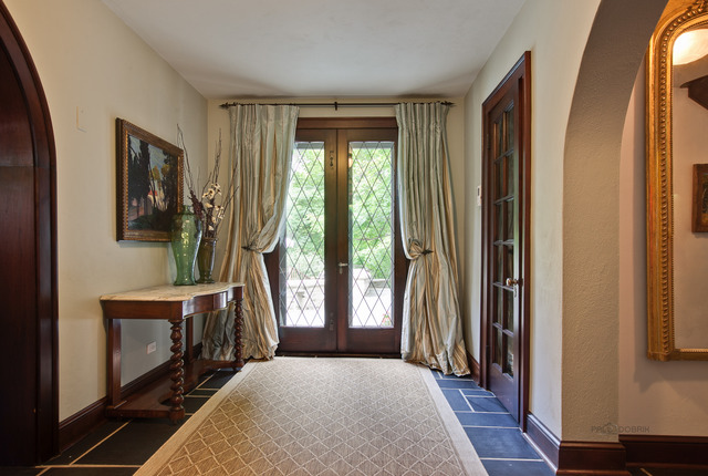 205 Franklin Road Glencoe, IL 60022 - Photo 4 of 25 a bedroom with a bed and wooden floor