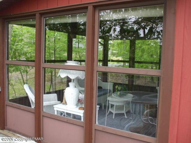 18 Cherry Ridge Road Bushkill, PA 18324 - Photo 4 of 16 a dining room with a window and a table