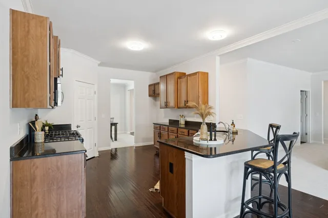 a view of an empty room with a bathroom
