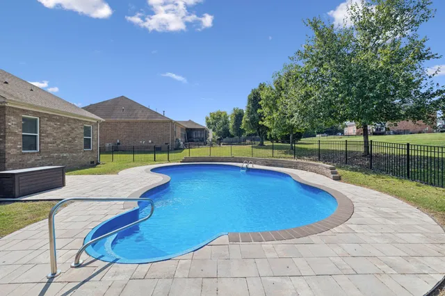 a view of outdoor space yard swimming pool and patio