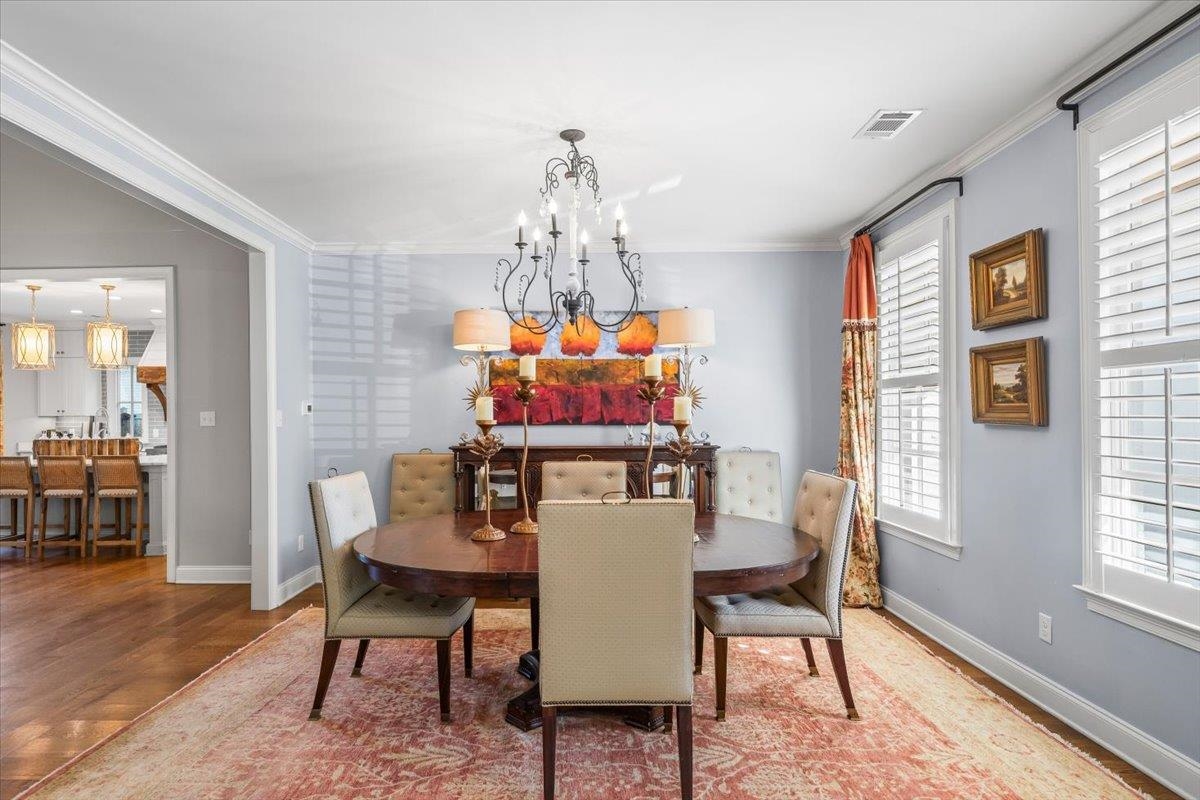 9074 Baynard Loop North Germantown, TN 38139 - Photo 12 of 36 a view of a dining room with furniture window and wooden floor
