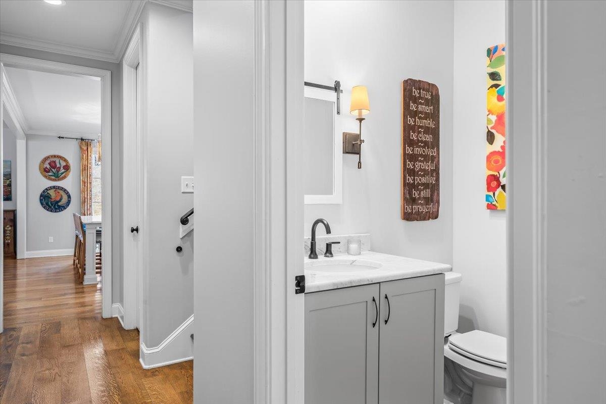 9074 Baynard Loop North Germantown, TN 38139 - Photo 23 of 36 a bathroom with a sink mirror vanity and toilet