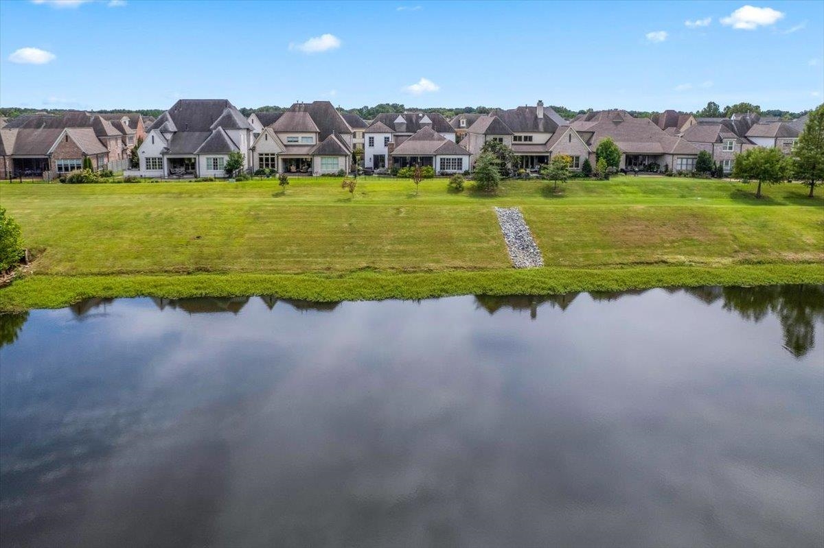 9074 Baynard Loop North Germantown, TN 38139 - Photo 32 of 36 a view of a lake with a house in the background