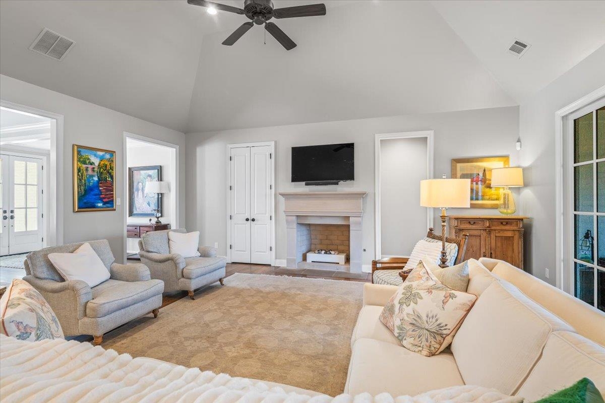 9074 Baynard Loop North Germantown, TN 38139 - Photo 7 of 36 a living room with furniture a fireplace and a flat screen tv