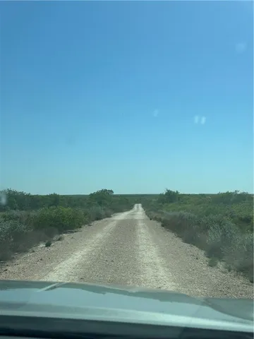 a view of a wooden fence