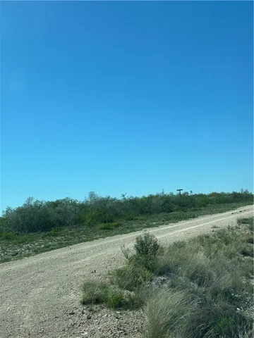 a view of city and green space