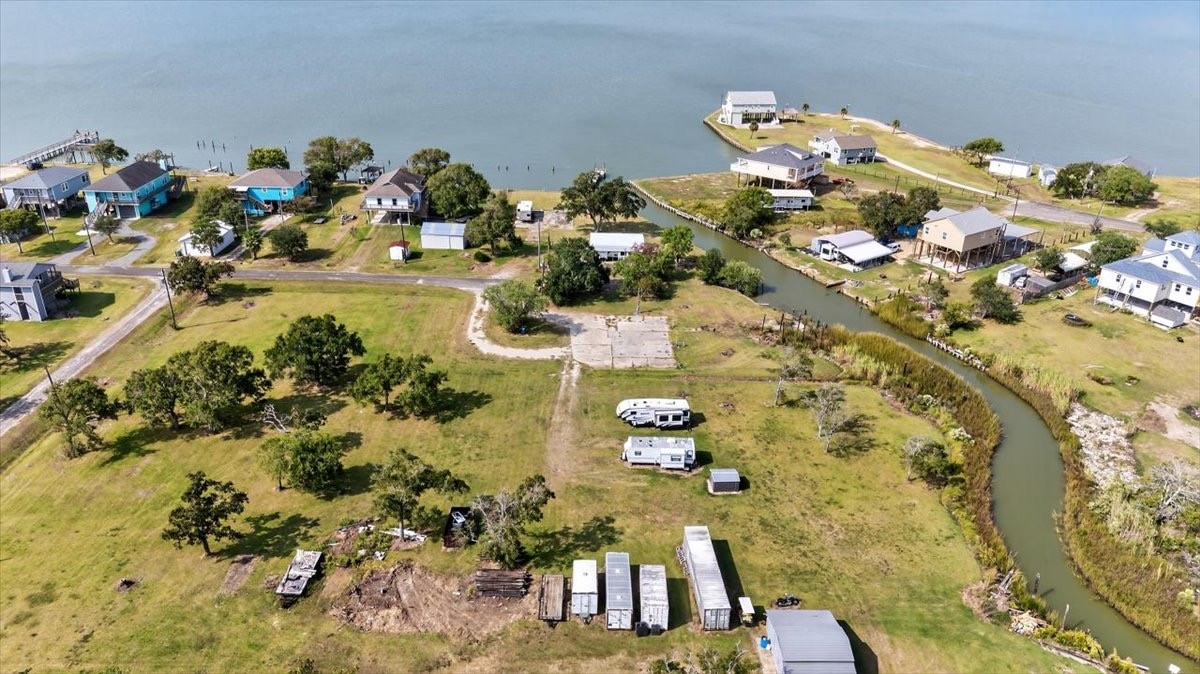 308 Spence Street Anahuac, TX 77514 - Photo 6 of 7 a vase of flowers sitting on a table