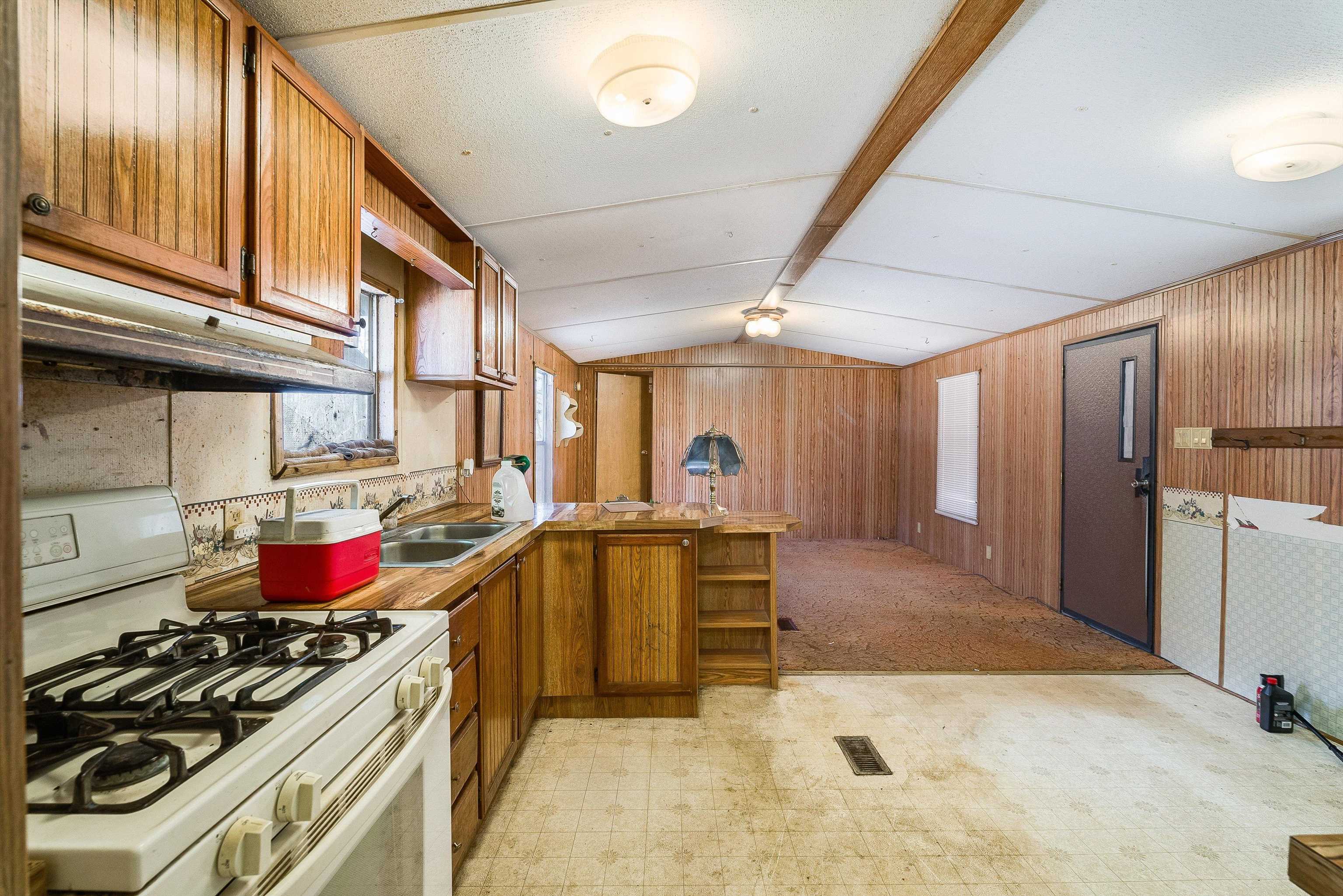 2851 Thoroughfare Road Elkton, VA 22827 - Photo 12 of 41 a kitchen with stainless steel appliances granite countertop a stove and cabinets