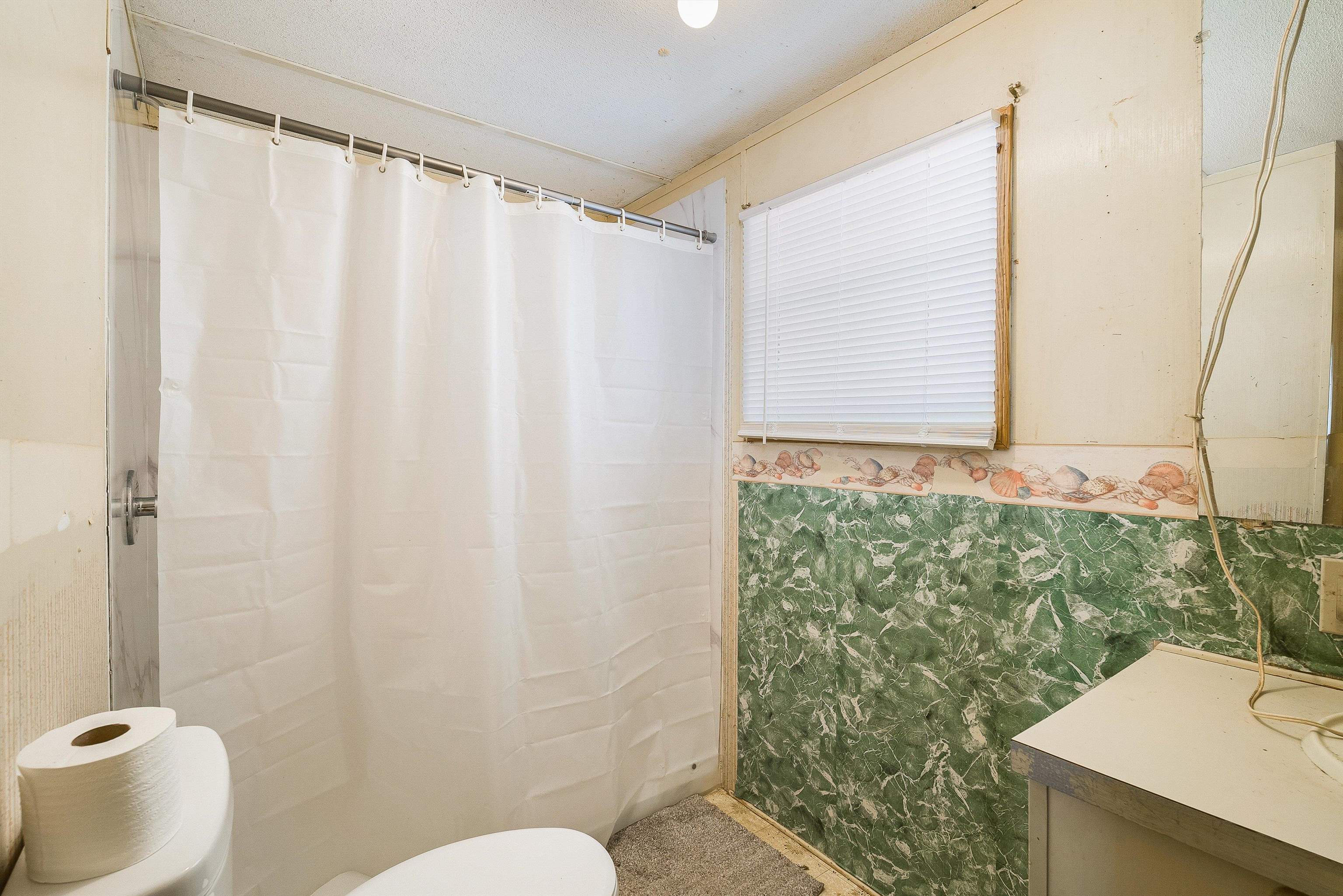 2851 Thoroughfare Road Elkton, VA 22827 - Photo 20 of 41 a bathroom with a sink and a mirror