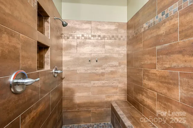 a bathroom with a sink and a gate
