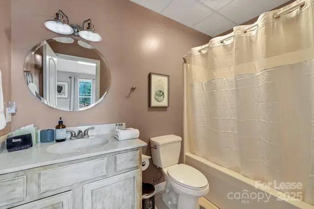 a living room with stainless steel appliances kitchen island granite countertop furniture and a kitchen view