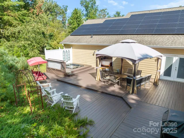 a patio with table and chairs
