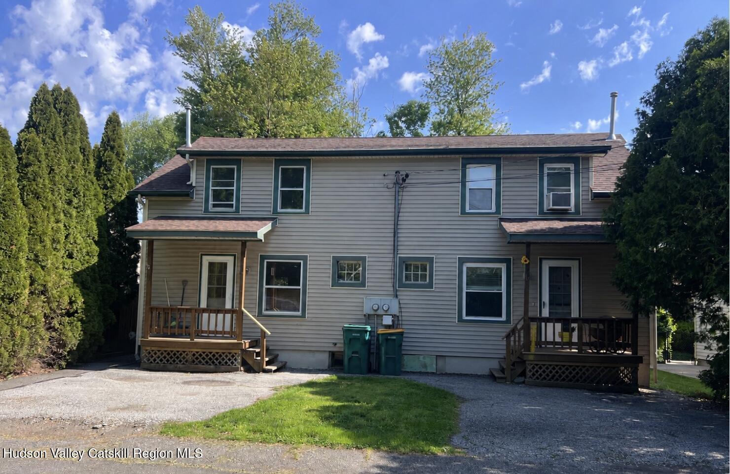 7 Berry Street Wallkill, NY 12589 - Photo 1 of 7 front view of a house with a yard