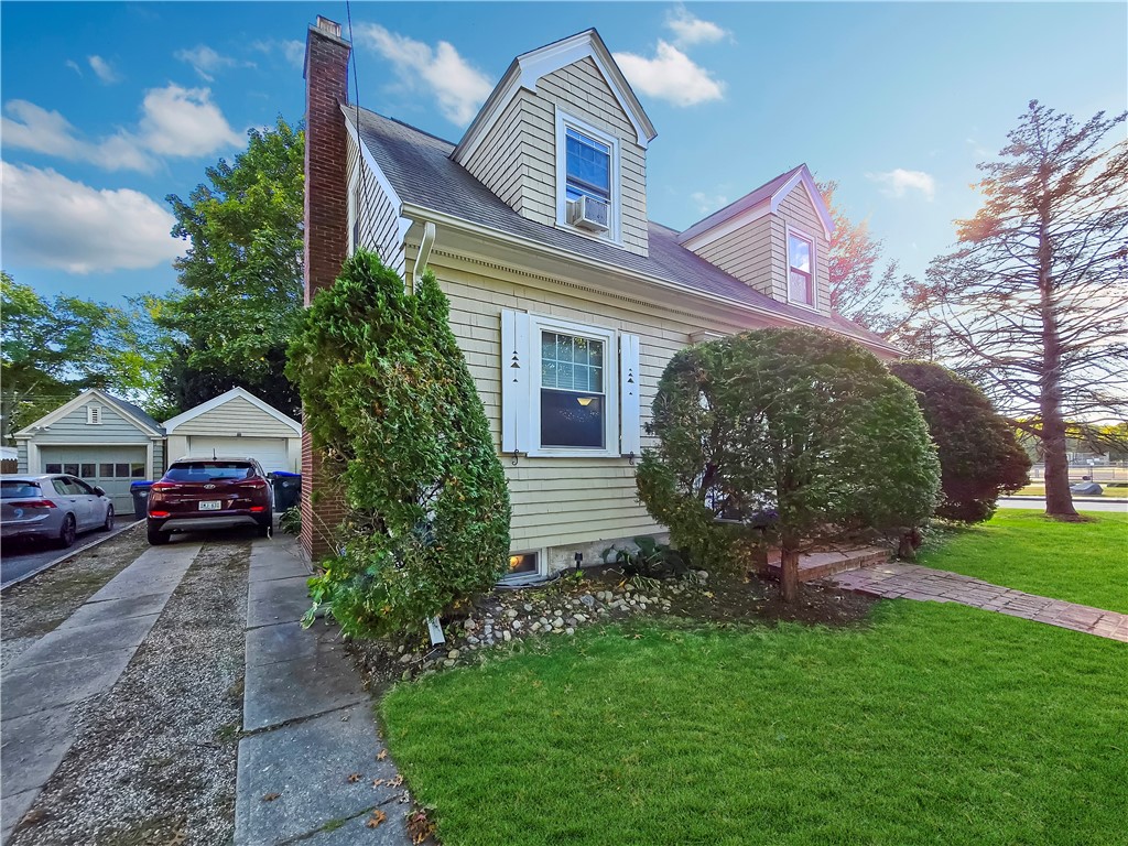 40 Rialto Street Providence, RI 02908 - Photo 3 of 23 front view, including the garage and driveway