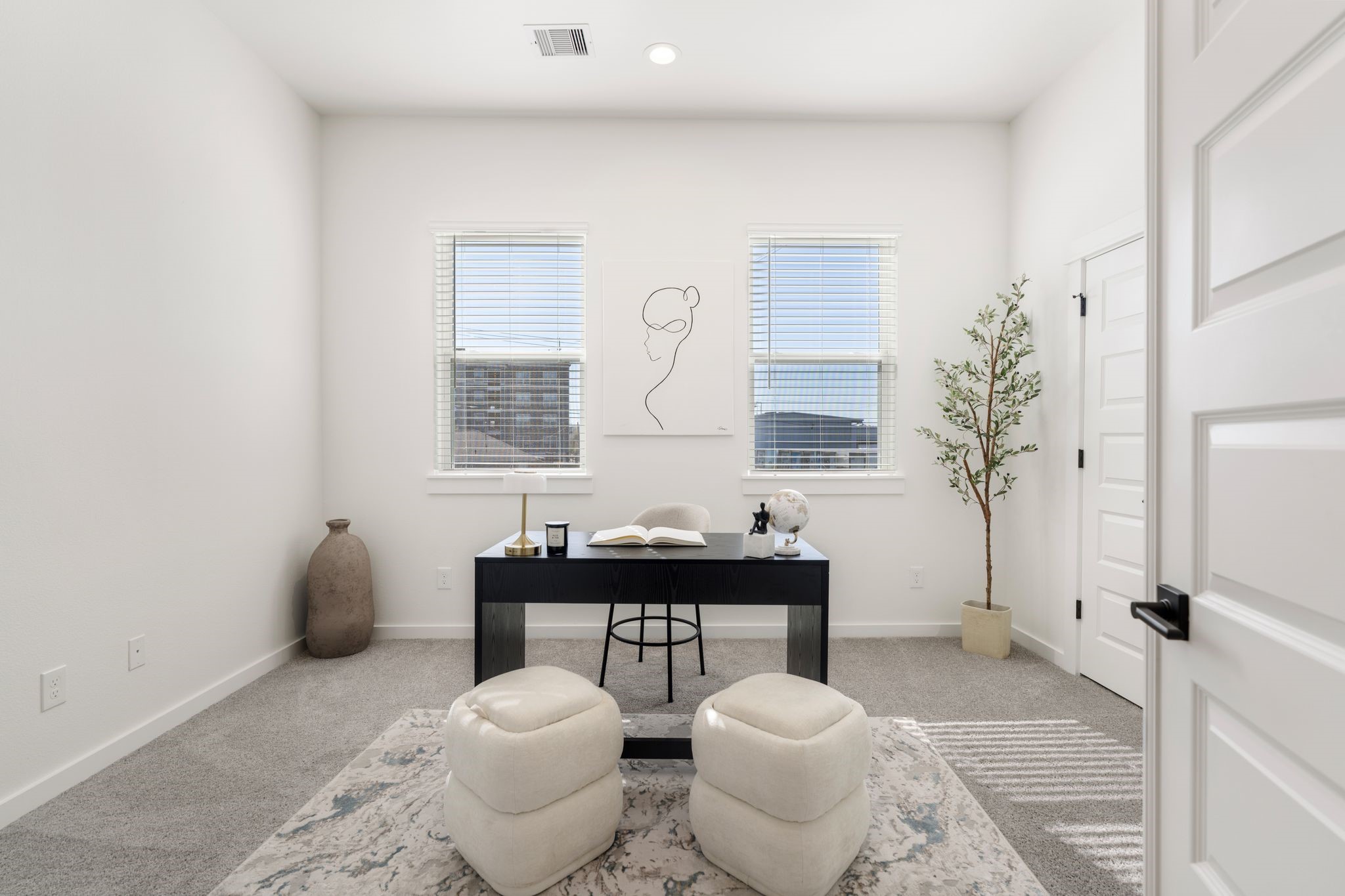 1215 Sampson Street Houston, TX 77003 - Photo 24 of 35 Conveniently located near the primary bedroom, this room can be used for a home office or in house gym.
