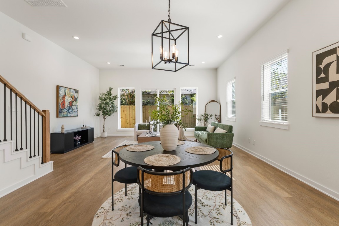 1215 Sampson Street Houston, TX 77003 - Photo 9 of 35 Spacious Dining area perfectly positoned between kitchen and living room.