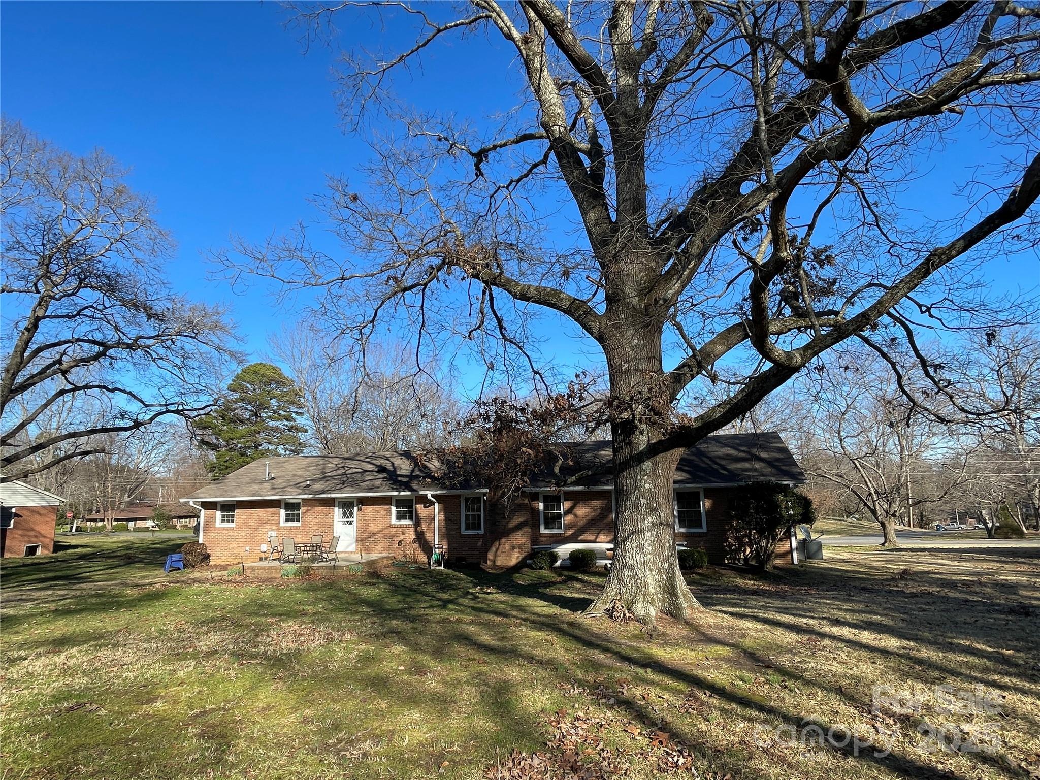 102 General Bragg Street Stanley, NC 28164 - Photo 5 of 31 a view of a backyard of the house