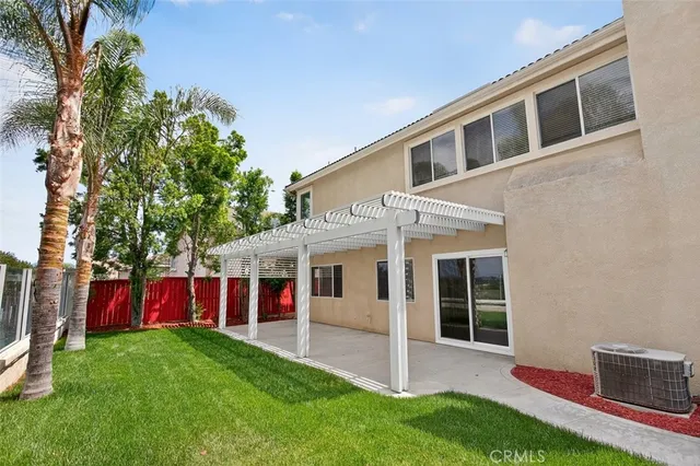 a view of house with yard