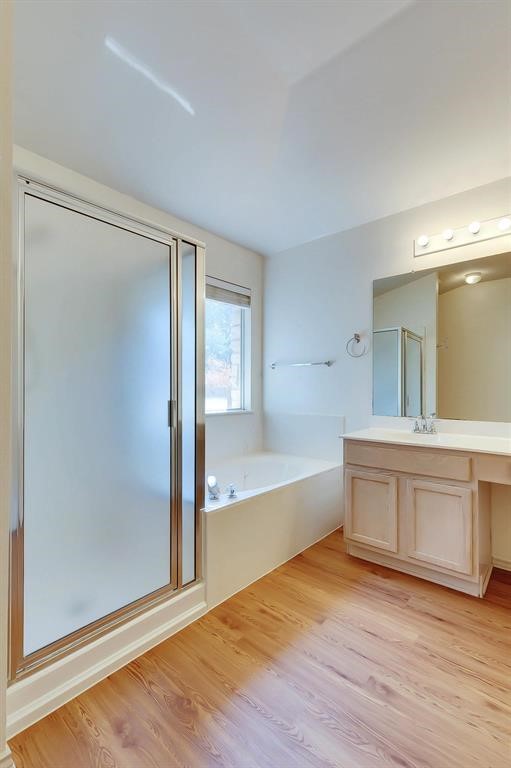 3337 Cantera Way Round Rock, TX 78681 - Photo 24 of 25 wooden floor in an empty room with a window