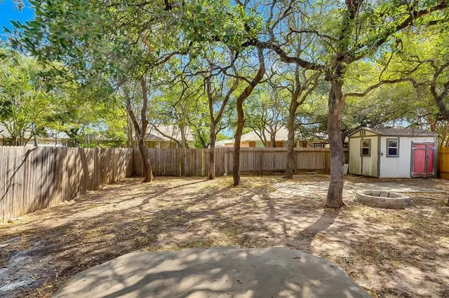 a house with trees in front of it