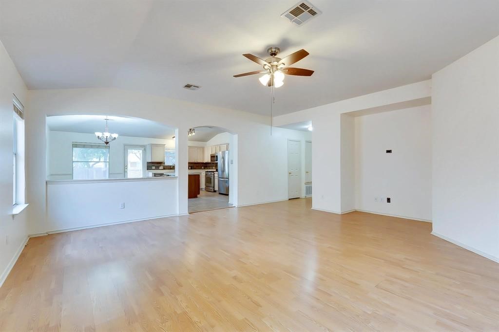 3337 Cantera Way Round Rock, TX 78681 - Photo 6 of 25 a view of empty room with wooden floor