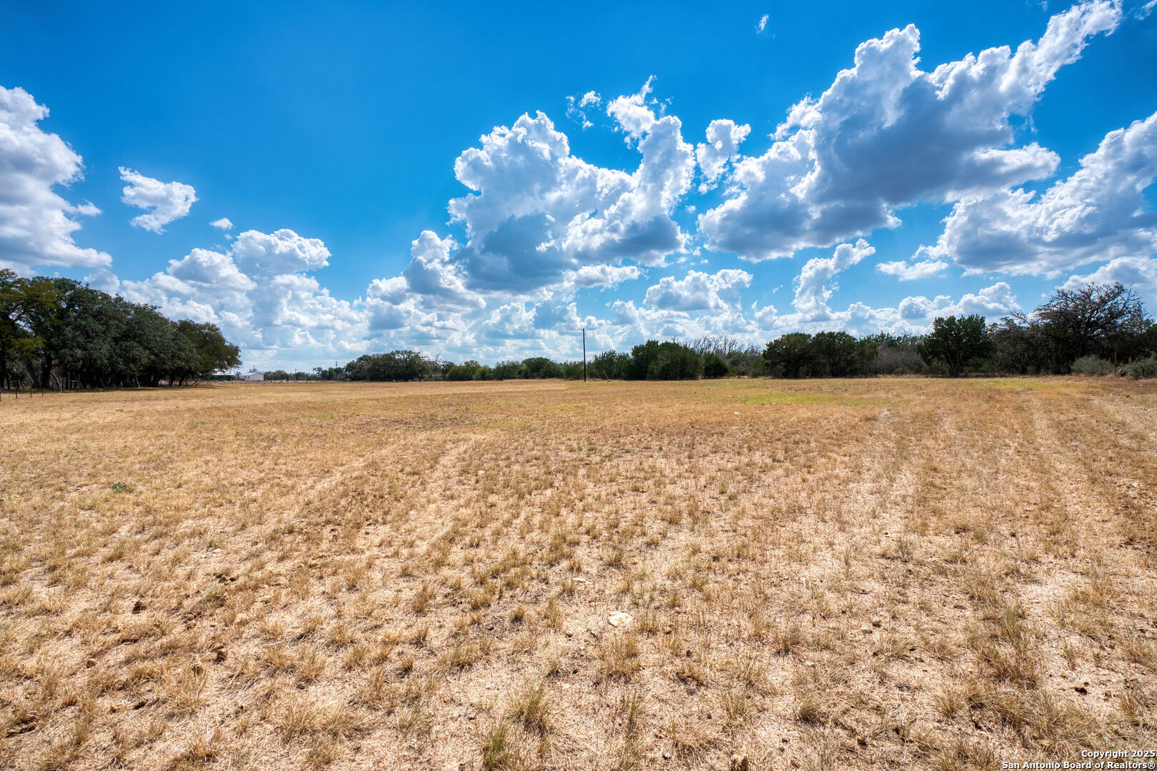 261 Watering Hole Trail Bandera, TX 78003 - Photo 17 of 24 a view of a lake