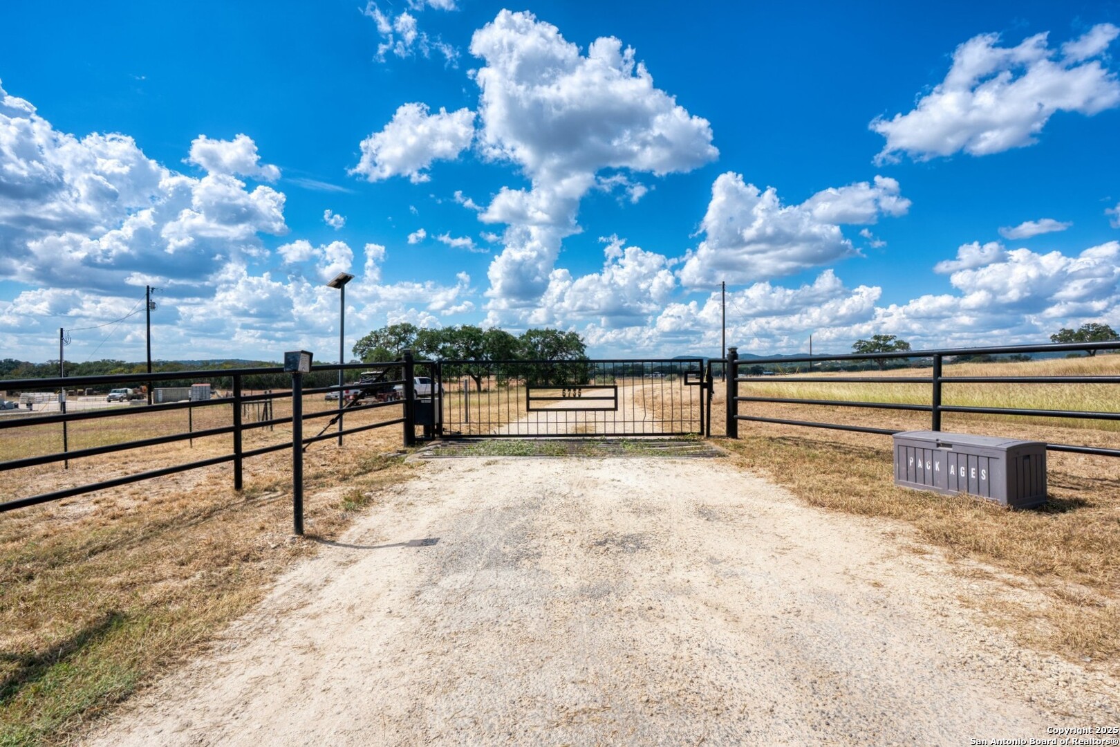 261 Watering Hole Trail Bandera, TX 78003 - Photo 24 of 24 a view of a street with houses