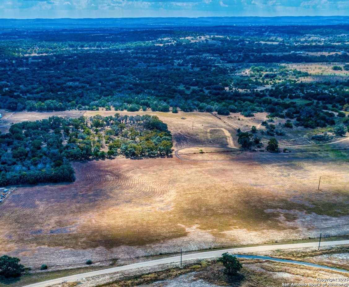 261 Watering Hole Trail Bandera, TX 78003 - Photo 5 of 24 a view of a street with an ocean view