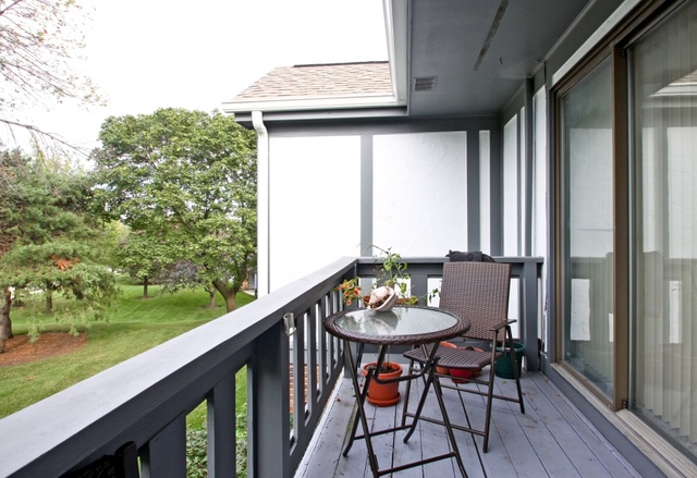 29 Stanton Court, Unit C2 Schaumburg, IL 60193 - Photo 9 of 9 a view of a outdoor seating area with furniture