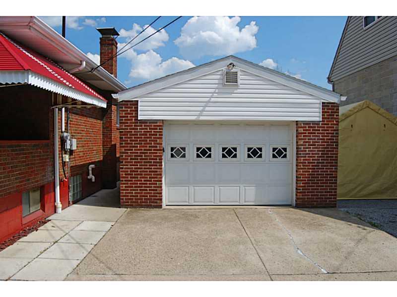 40 Glenn Way McKees Rocks, PA 15136 - Photo 22 of 24 Parking Lot/Garage. Over-sized detached 1 car garage with automatic door opener.