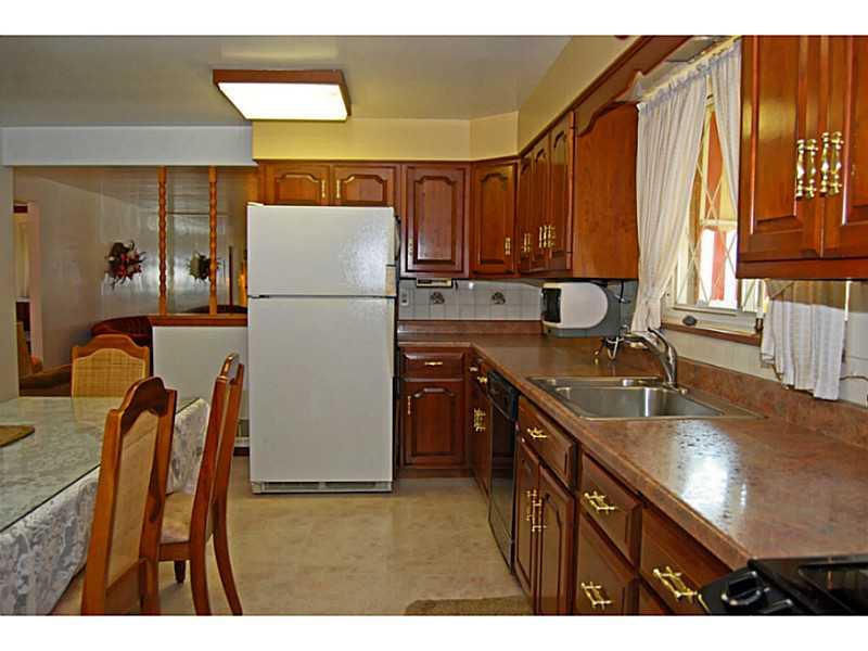 40 Glenn Way McKees Rocks, PA 15136 - Photo 5 of 24 Kitchen. Large eat-in kitchen with updated flooring, sink with disposal, counter tops, and lots of cabinets.
