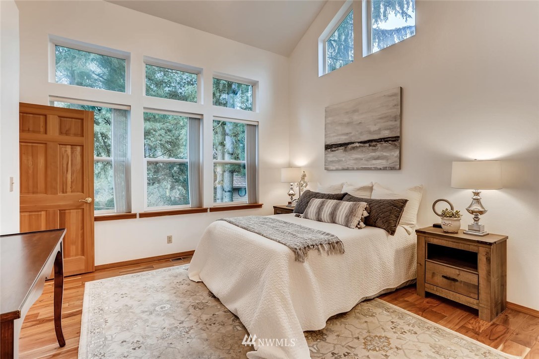 3427 Southeast 7th Street Renton, WA 98058 - Photo 20 of 32 a bedroom with a bed and a window with the outer view