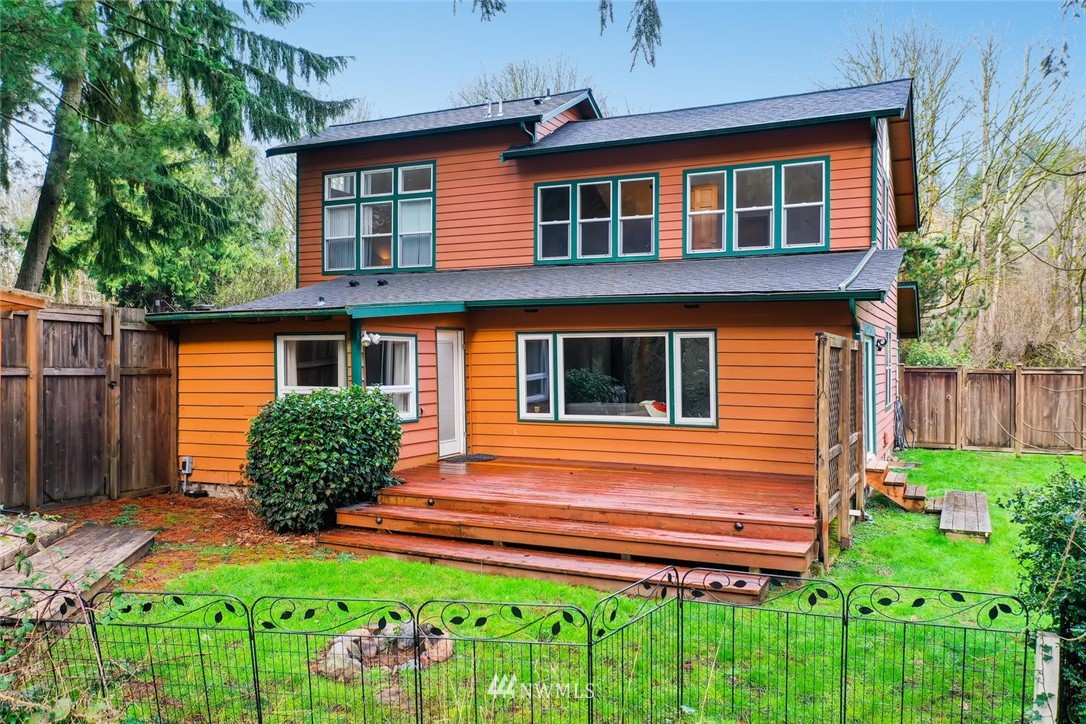 3427 Southeast 7th Street Renton, WA 98058 - Photo 3 of 32 a front view of a house with garden