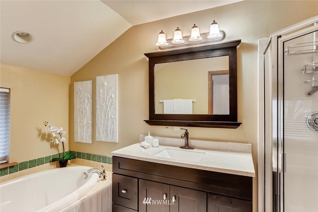 3427 Southeast 7th Street Renton, WA 98058 - Photo 22 of 32 a bathroom with a sink and a mirror
