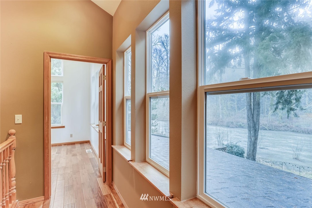 3427 Southeast 7th Street Renton, WA 98058 - Photo 23 of 32 a view of a glass door and the balcony