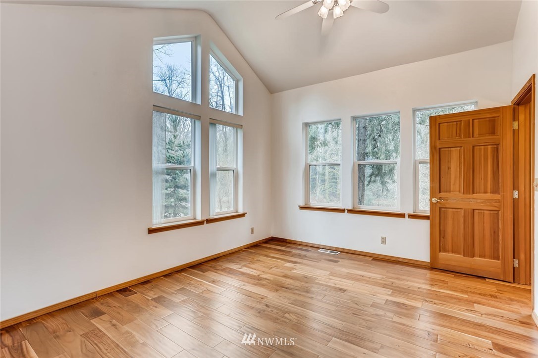 3427 Southeast 7th Street Renton, WA 98058 - Photo 25 of 32 an empty room with windows and closet
