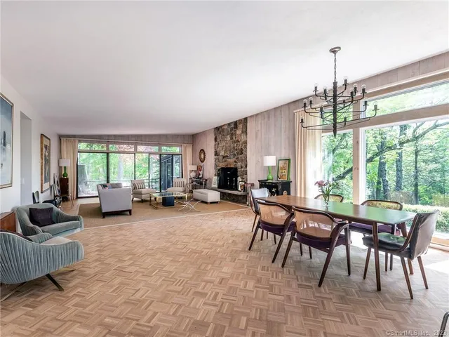 a view of a livingroom with furniture window and outside view