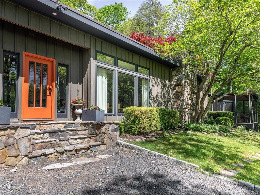 95 Shinar Mountain Road Washington, CT 06794 - Photo 24 of 28 a front view of a house with garden