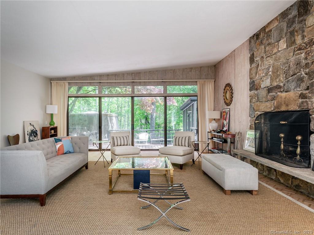 95 Shinar Mountain Road Washington, CT 06794 - Photo 3 of 28 a living room with furniture and a fireplace